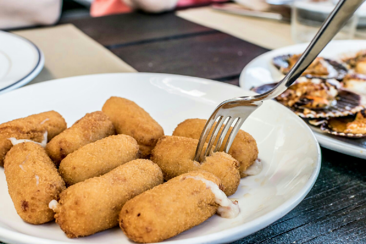 Crocchette filanti di polenta e taleggio: l'antipasto rustico perfetto per ogni occasione